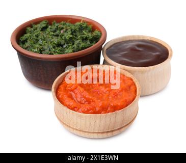 Different fresh marinades in bowls isolated on white Stock Photo