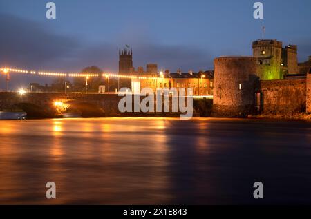 Illuminated view of King John's castle on the river Shannon in Limerick city in Ireland Europe Stock Photo