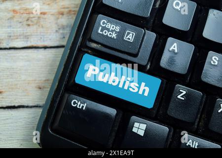 Concept of Publish Text written in torn paper. Stock Photo