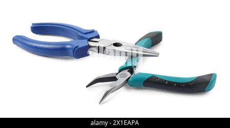 Different pliers isolated on white. Construction tool Stock Photo