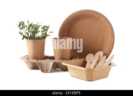 Eco friendly food packagings, tableware and twigs isolated on white Stock Photo
