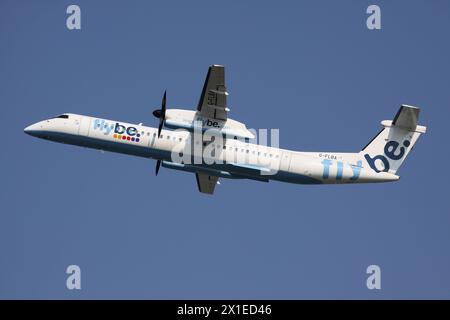 British flybe Bombardier DHC-8-400 Dash 8 with registration G-FLBA just airborne at Dusseldorf Airport Stock Photo