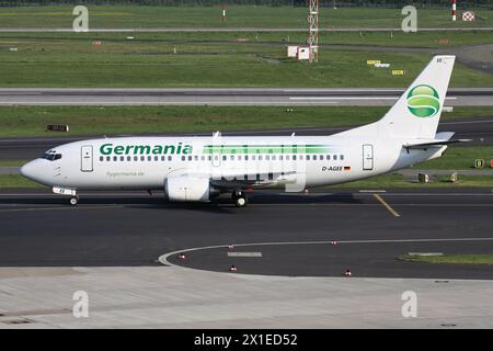 German Germania Boeing 737-300 with registration D-AGEE on taxiway at Dusseldorf Airport Stock Photo
