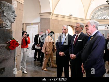 Washington, United States. 16th Apr, 2024. Czech Prime Minister Petr Fiala, center, paid tribute to the memory of former Czechoslovak and Czech President Vaclav Havel during his visit to the US Congress in Washington, USA, in April 16, 2024. At Havel's bust, he presented silver commemorative coins to Congressmen Lloyd Doggett, right, and Mario Diaz-Balart, left, who together lead the informal group Friends of the Czechia. Credit: Katerina Sulova/CTK Photo/Alamy Live News Stock Photo