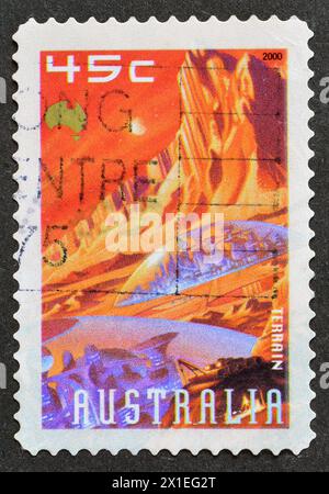 Cancelled postage stamp printed by Australia, that shows Martian Terrain,  Mars Exploration, circa 2000. Stock Photo