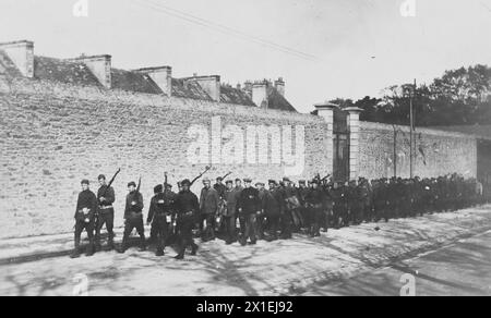 German prisoners of war being marched down a street in Brest, France ca. 1917-1919 Stock Photo
