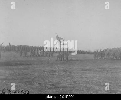 Colors in review, generals and staff in the background; near Le Mans, Sarthe, France ca. 1919 Stock Photo