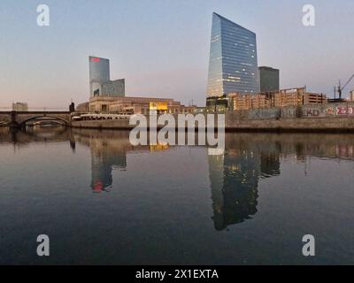 From left, the FMC Tower, Cira Centre South and Cira Centre are reflected in the Schuylkill River in the early morning. Stock Photo