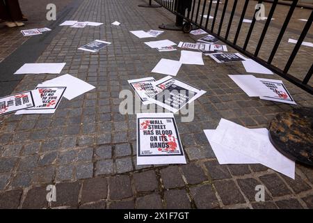 New York, United States. 15th Apr, 2024. Pro-Palestinian flyers litter the street outside of the New York Stock Exchange (NYSE) during a Palestine protest. (Photo by Michael Nigro/Pacific Press) Credit: Pacific Press Media Production Corp./Alamy Live News Stock Photo