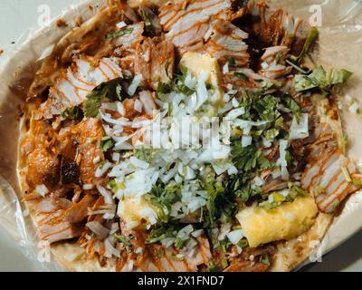 Top view of large plate Mexican al pastor street tacos with cilantro, onion, and pineapple. Stock Photo