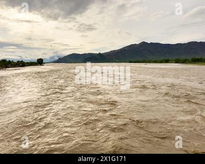 Flood in river swat after heavy raining in the valley Stock Photo