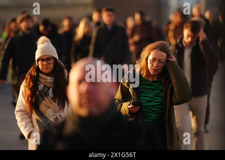 File photo dated 22/01/24 of commuters battling strong winds in London Bridge. UK inflation has been predicted to fall to its lowest level since September 2021 when fresh economic data is released. The Office for National Statistics is expected to reveal on Wednesday that Consumer Prices Index (CPI) inflation was around 3.1% in March, according to a consensus of economists. Issue date: Wednesday April 17, 2024. Stock Photo