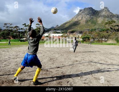 Cape Town - South Africa: Children playing soccer on Tuesday, June 8th 2010.APA-PHOTO: HELMUT FOHRINGER - BS004583 - 20100608 PD3699 - Rechteinfo: Rights Managed (RM) Stock Photo