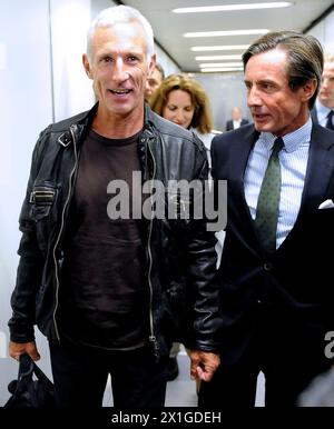 Eugene A., Austrian intensive care physician, and Peter Launsky-Tieffenthal, spokesman for the Foreign Ministry, on the occasion of the arrival of Eugene A.  at Wien-Schwechat airport on 28 September 2011. Eugene A. is allegedly responsible for the death of a paraplegic patient by omission of assistance and the administration of a high dose of opiates in February 2009 in the Rashid Hospital in the Arab emirates. - 20110928 PD0186 - Rechteinfo: Rights Managed (RM) Stock Photo