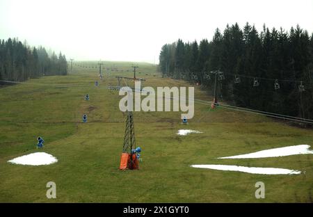 No snow in sight in Salzburg, Austria on 27 November 2014. In the picture: Snow cannons stand on the green meadow in the skiing region Flachau. - 20141127 PD1574 - Rechteinfo: Rights Managed (RM) Stock Photo