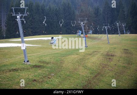 No snow in sight in Salzburg, Austria on 27 November 2014. In the picture: Snow cannons stand on the green meadow in the skiing region Flachau. - 20141127 PD1568 - Rechteinfo: Rights Managed (RM) Stock Photo