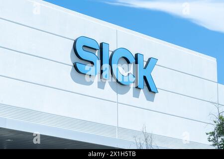 Houston, Texas, USA - April 13, 2024: Close up of SICK sign on the building at one of their facilities in Houston, Texas, USA. Stock Photo