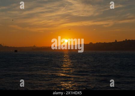 Sunset in Istanbul. Galata Tower and mosques in the photo. Travel to Istanbul background. Stock Photo