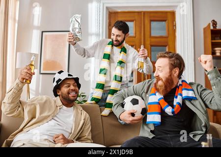 Three handsome men, different ethnicities, dressed casually, share joy atop a couch. Stock Photo