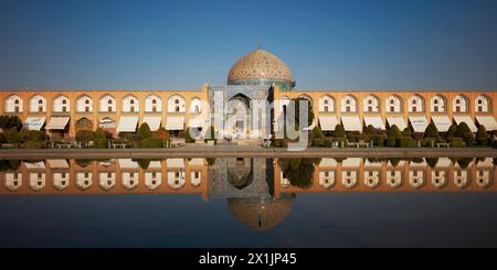 Panoramic view of the Lotfollah Mosque reflected in a water pool. Naqsh-e Jahan Square, Isfahan, Iran. Stock Photo