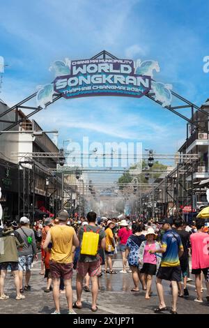 CHIANG MAI - APRIL 13, 2024 ; Songkran Festival is celebrated in a traditional. People enjoy splashing water on Tha Pae Gate in Chiang-mai, Thailand. Stock Photo