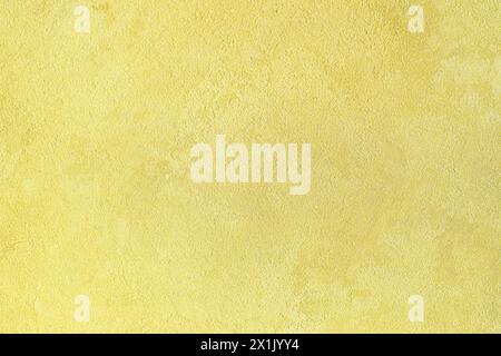 Texture of golden decorative plaster or concrete. Abstract gold grunge background for design. Stock Photo
