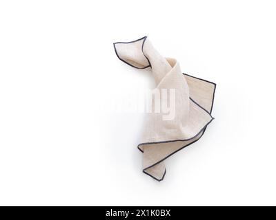 Flat lay with linen kitchen napkin isolated on white background. Folded cloth for mockup Stock Photo