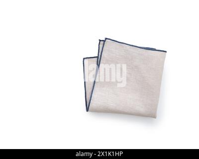 Flat lay with linen kitchen napkin isolated on white background. Folded cloth for mockup Stock Photo
