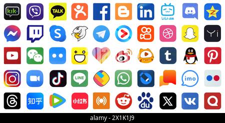 KYIV, UKRAINE - APRIL 1, 2024 Many icons of popular social media, messengers, video sharing platforms and other smartphone services printed on white paper Stock Photo