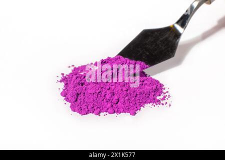 bunch of pink pigment, macro, top view, isolated on white background, pink ultramarine, pink ocher, purple Stock Photo