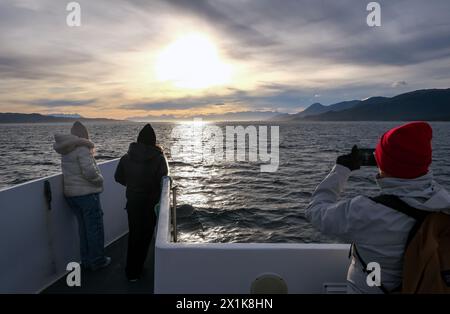 Ushuaia, Tierra del Fuego, Argentina - Tourists on an excursion boat in the Beagle Channel, the Beagle Channel is a natural waterway at the southern t Stock Photo