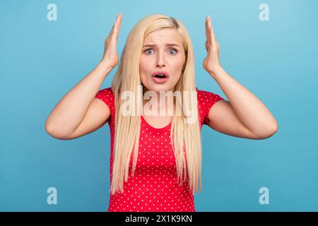 Photo portrait woman blonde hair crazy arguing complaining isolated pastel blue color background Stock Photo