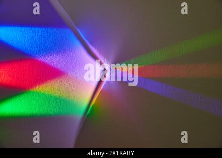 Color Spectrum Light Play on Room Corner Stock Photo