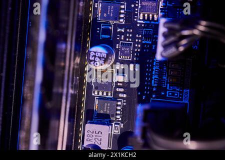 Close-Up Computer Motherboard Circuitry and Components, Macro View Stock Photo