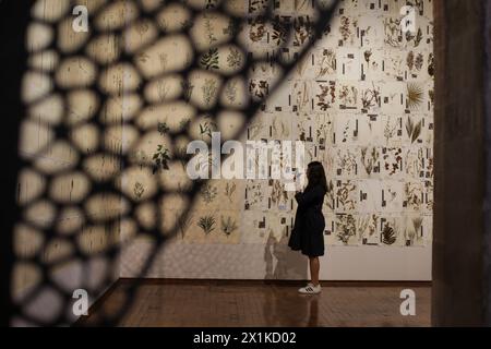 Mexico City, Mexico. 16th Apr, 2024. A woman visits the Atlas exhibition by artists Jan Hendrix of the Netherlands at the Citibanamex Culture Palace, in Mexico City, Mexico, on April 16, 2024. Credit: Francisco Canedo/Xinhua/Alamy Live News Stock Photo