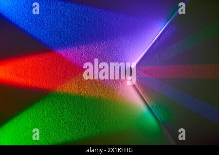 Vibrant Spectrum Light Burst on Textured Surface Stock Photo