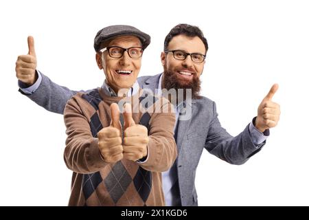 Bearded man standing behind an older man and gesturing thumbs up isolated on white background Stock Photo