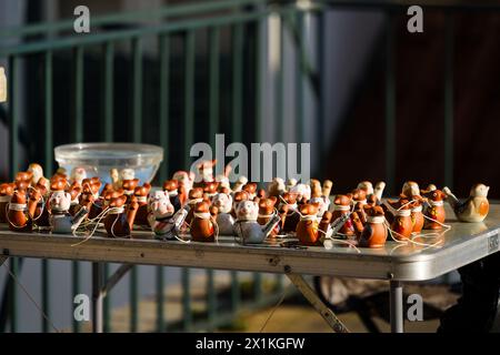 Traditional Portuguese Souvenirs Displayed on a Street Vendors Table in Sunlight. Lisbon, Portugal. February 1, 2024. Stock Photo