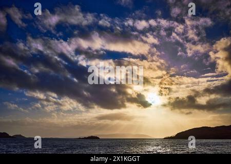 West from Craobh Haven, The sun starts to sink low as dusk begins to ...