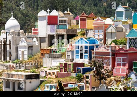 The colorful tombs and vaults of the Cementerio General in Chichicastenango, Guatemala. According to indigenous Maya tradition, the colorful burial site honors the dead and encourages the living to make peace with death. Stock Photo