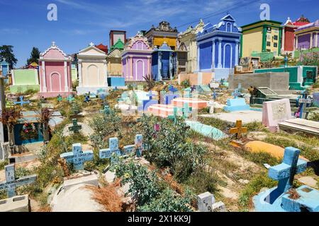 The colorful tombs and vaults of the Cementerio General in Chichicastenango, Guatemala. According to indigenous Maya tradition, the colorful burial site honors the dead and encourages the living to make peace with death. Stock Photo