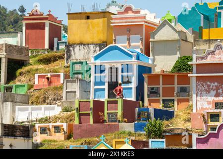 The colorful tombs and vaults of the Cementerio General in Chichicastenango, Guatemala. According to indigenous Maya tradition, the colorful burial site honors the dead and encourages the living to make peace with death. Stock Photo