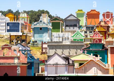 The colorful tombs and vaults of the Cementerio General in Chichicastenango, Guatemala. According to indigenous Maya tradition, the colorful burial site honors the dead and encourages the living to make peace with death. Stock Photo