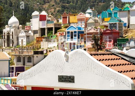 The colorful tombs and vaults of the Cementerio General in Chichicastenango, Guatemala. According to indigenous Maya tradition, the colorful burial site honors the dead and encourages the living to make peace with death. Stock Photo