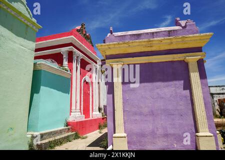 The colorful tombs and vaults of the Cementerio General in Chichicastenango, Guatemala. According to indigenous Maya tradition, the colorful burial site honors the dead and encourages the living to make peace with death. Stock Photo