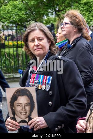 St James's Square, London, UK. 17th April 2024. Retired and serving police officers from around the UK join family and friends of Police Constable Yvonne Fletcher outside the former Libyan embassy, London on the 40th anniversary of the murder of the 25 year old officer . On the morning of 17th April 1984 PC Fletcher and other Metropolitan police officers were deployed to an anti Libyan regime protest taking place outside the Embassy when a number of shots were fired from the first floor of the building. One bullet hit PC Fletcher causing fatal injuries. Despite the 2015 arrest of Libyan leade Stock Photo