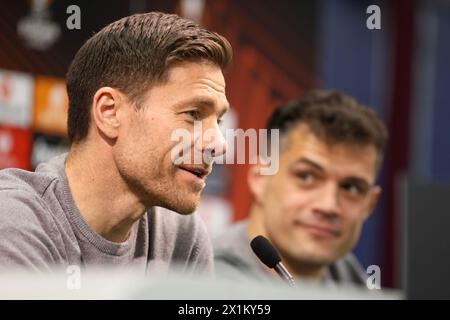 London, UK. 17th Apr, 2024. London, England, April 17th 2024: Bayer Leverkusen manager Xabi Alonso and Granit Xhaka (34 Bayer Leverkusen) during the press conference prior to the UEFA Europa League match between West Ham United and Bayer Leverkusen at the London Stadium in London, England (Alexander Canillas/SPP) Credit: SPP Sport Press Photo. /Alamy Live News Stock Photo