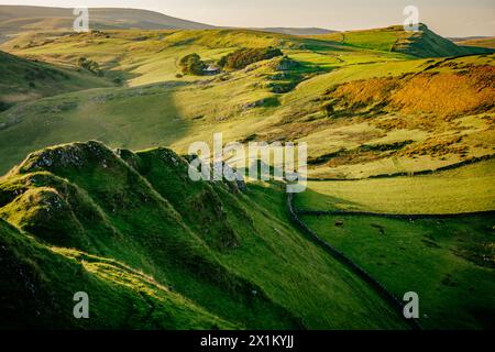 Evening light on the jagged ridge of Chrome hill or Dragon's Back near Buxton in the Derbyshire Peak District Stock Photo