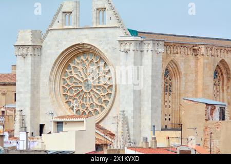 Tarragona, Spain - April 17, 2024: Captured under clear skies, the cathedral offers an impressive view, marking the cityscape with its imposing presen Stock Photo