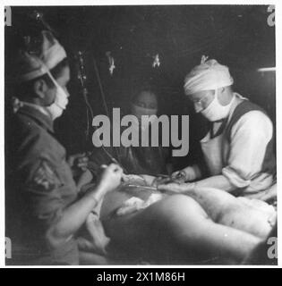 ITALY : FIFTH ARMYANZIO BRIDGEHEAD - American and British surgeons performing an operation at a ( ) Division C.C.S, British Army Stock Photo